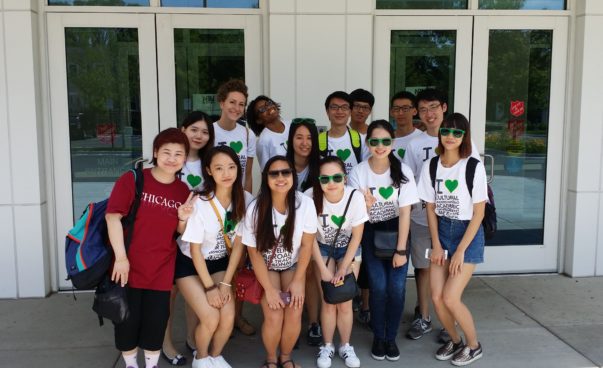 Several students from all over the world posing for a picture